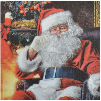 20 serviettes en papier Pere noel dans son fauteuil